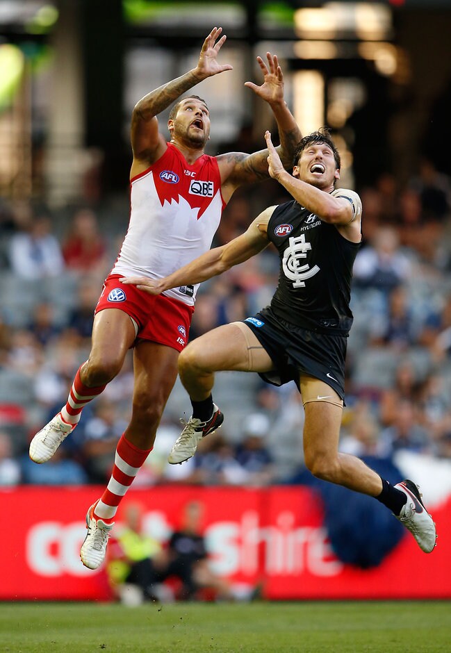 AFL 2016 NAB Challenge - Carlton v Sydney MELBOURNE, AUSTRALIA - MARCH 11: Lance Franklin of the Swans and Michael Jamison of the Blues compete for the ball during the 2016 NAB Challenge match between the Carlton Blues and the Sydney Swans at Etihad Stadium, Melbourne on March 11, 2016. (Photo by Adam Trafford/AFL Media)